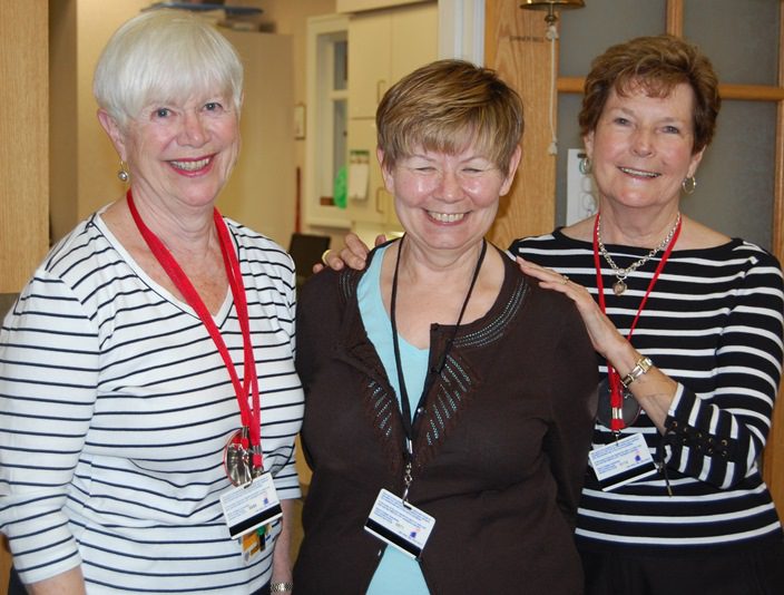 Alice Sherman, Lee Ensign, Barb Fisher smiling at camera