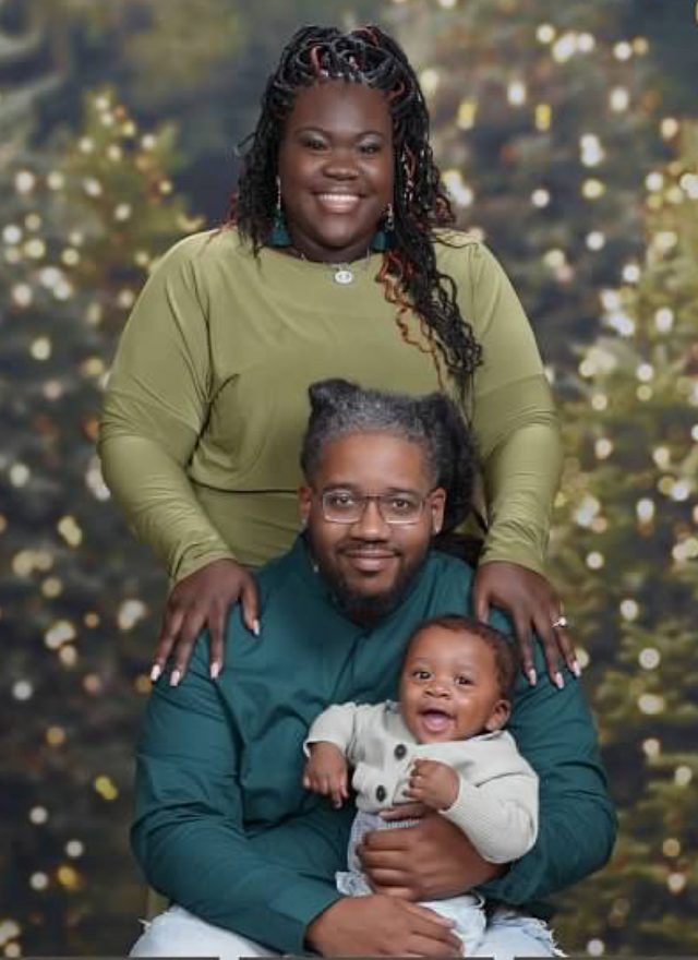 Family photo: mom, dad and baby boy
