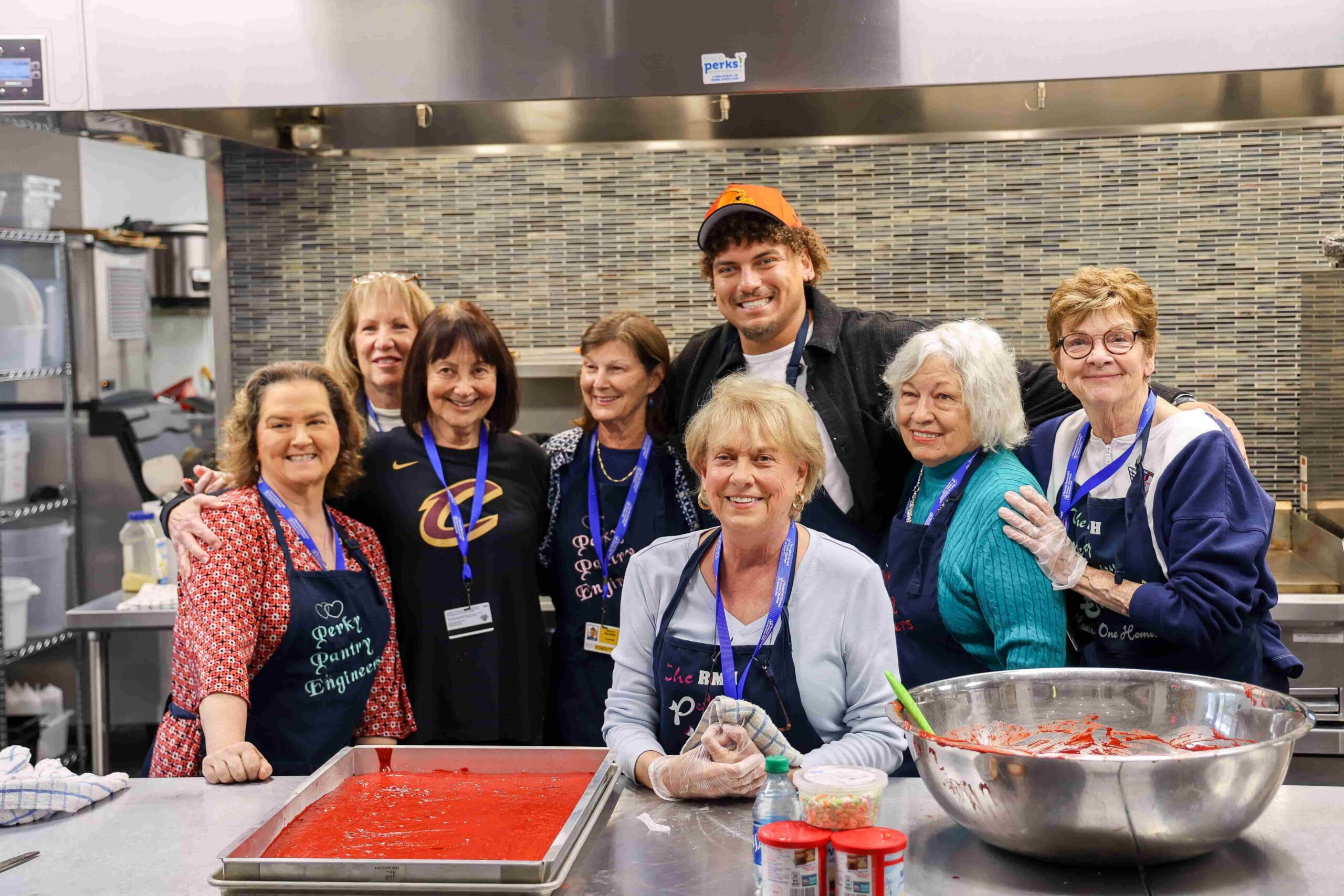 Josh Naylor and the Perky Pantry Engineers smile for a photo together.
