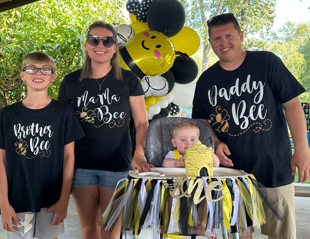 family celebrating one year old birthday